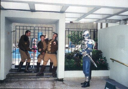 Colonial Warriors confront a Cylon